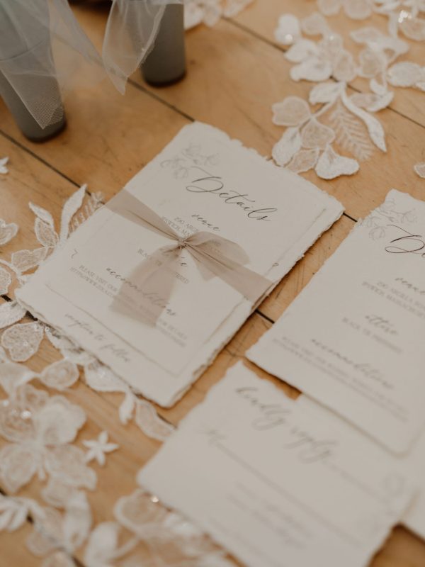 beautiful wedding invitation flat lay with neutral wedding stationary