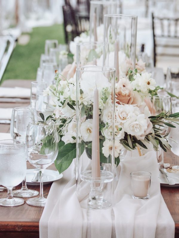 wedding table setting with floral centerpieces and candles designed by Only Prettier Design